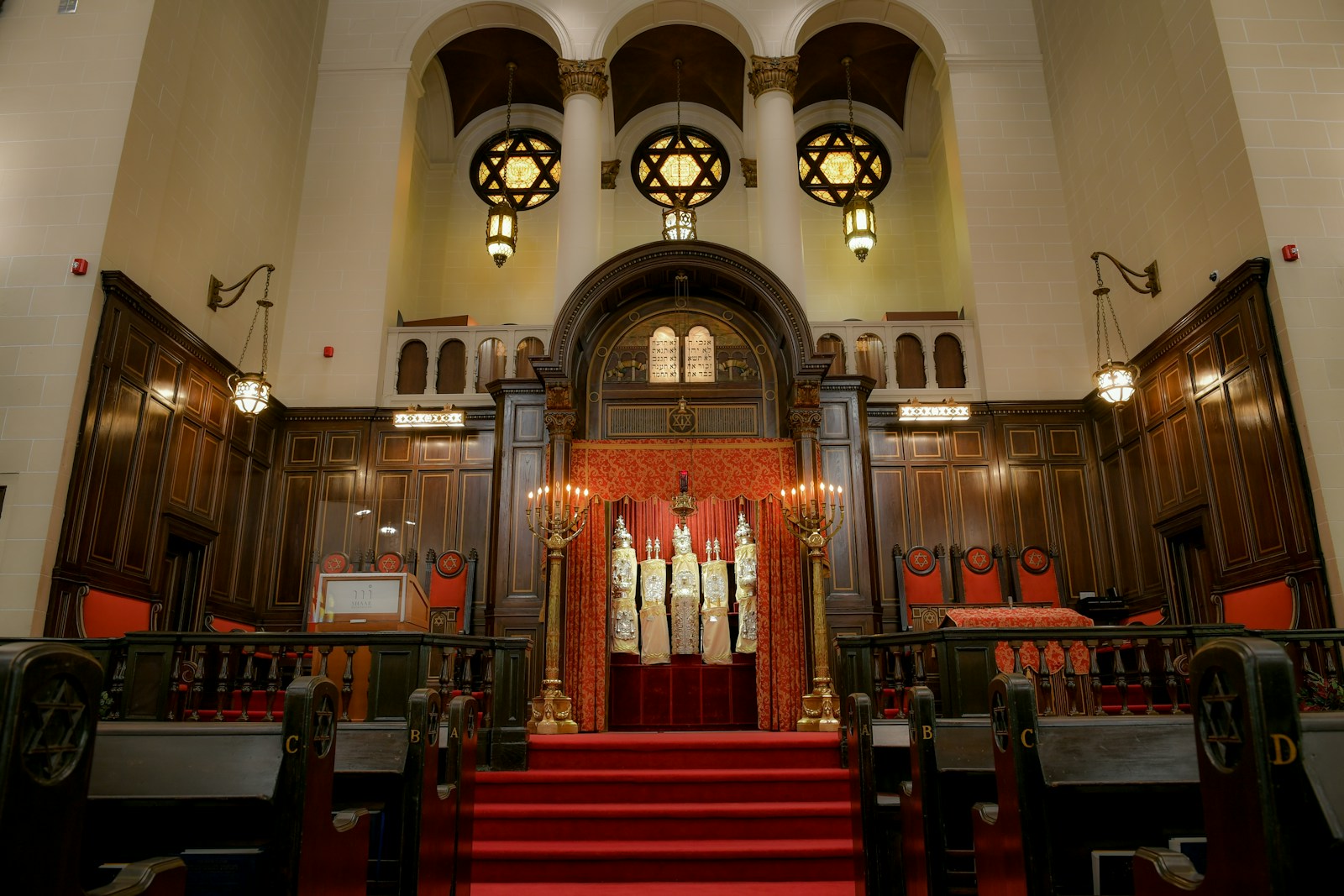 brown wooden chairs inside church